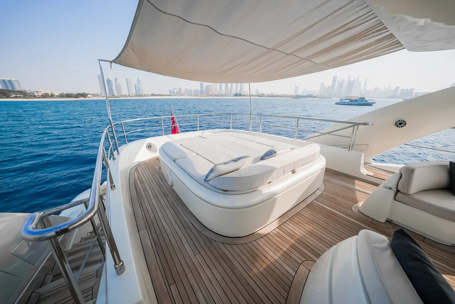 Flybridge sun beds and shaded lounge seating