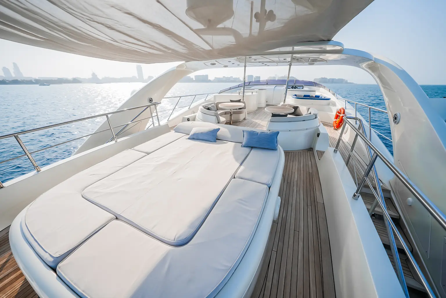Sun pads on the foredeck facing the open sea