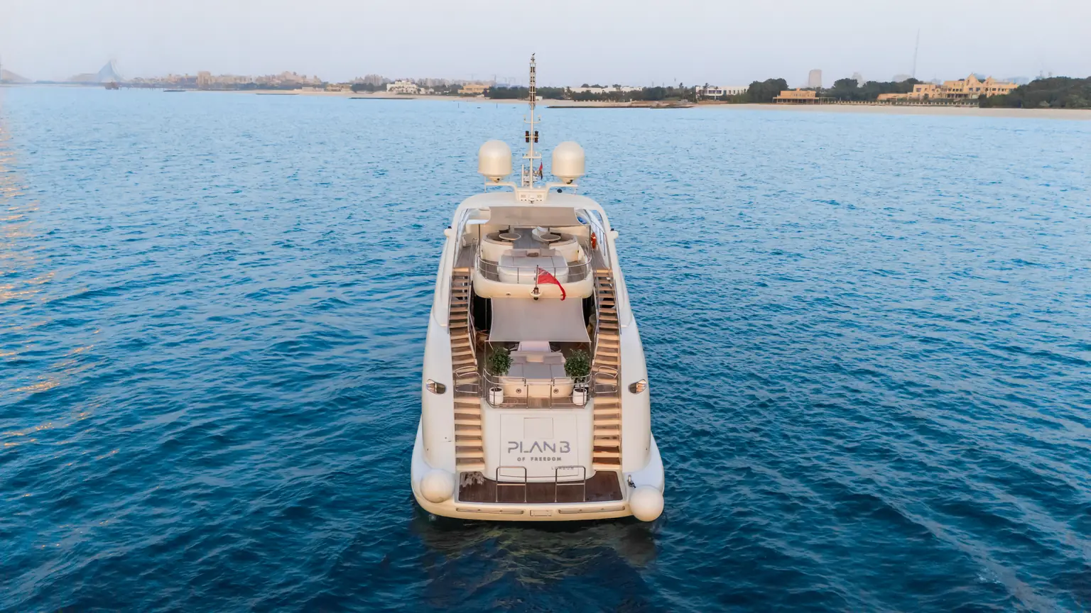 Stern of Plan B of Freedom seen from astern, with her name lettered across the transom
